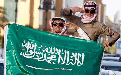 The Saudi Arabia flag, which says “There is no God but Allah, and Muhammad is his messenger”. Photo: AP