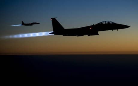 A pair of US Air Force F-15E Strike Eagle fighter jets fly over Kurdistan region. AP file photo