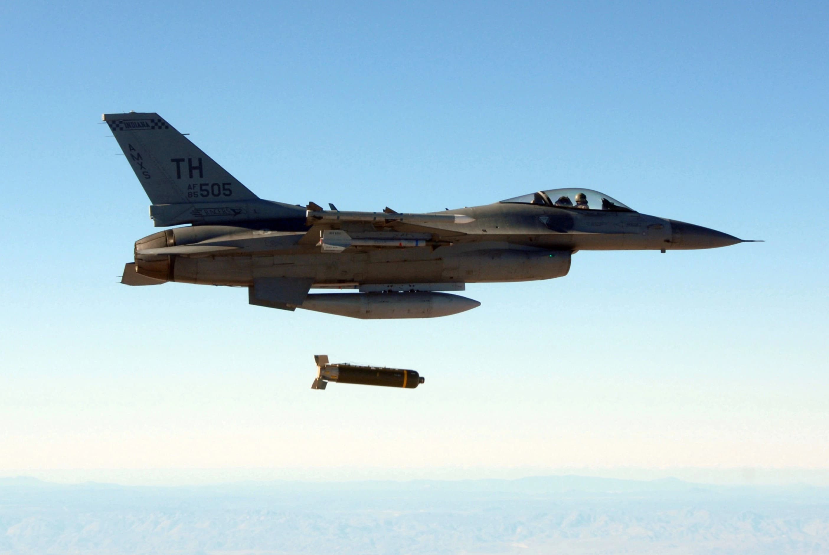 F-16 dropping cluster bomb: photo by AP