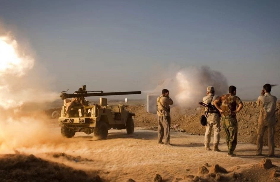   Peshmerga artillery pounds ISIS on Bashik front near Mosul. Photo by Rudaw. 