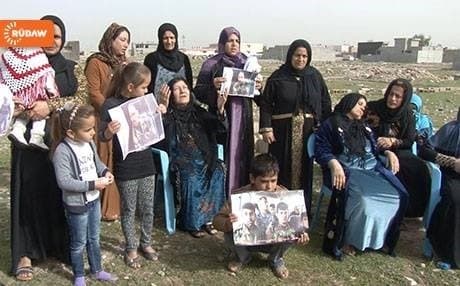 Kurdish families gather in Kirkuk days after pro-ISIS social media accounts published images of Peshmerga captives in orange jumpsuits and in cages being paraded through the streets of Hawija in southern Kirkuk province. Photo by Rudaw