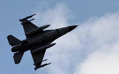 A Turkish fighter jet flies above the Incirlik airbase in southern Turkey. AP file photo.