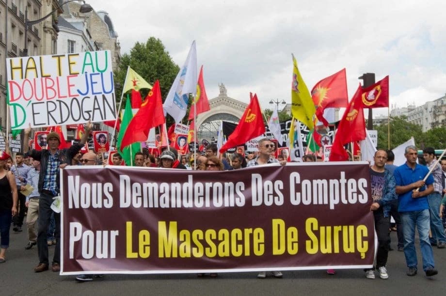  Kurdish demonstrators protest in Paris, France, Saturday, July 25, 2015, denouncing the deaths of 32 people at a suicide bombing Monday, July 20, in Suruc, southeastern Turkey. Photo by AP. 