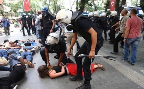 Demonstrators are detained by Turkish police officers during a protest in Ankara condemning a suicide bombing. Photo: AFP 
