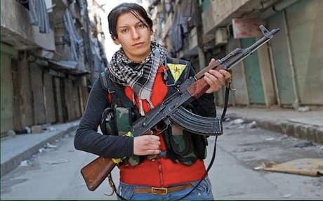 A female member of the Kurdish People's Defense Units (YPG). Her units have been locked in fierce clashes with members of the radical Jabhat al-Nusrah near the border with Turkey. Photo: AFP