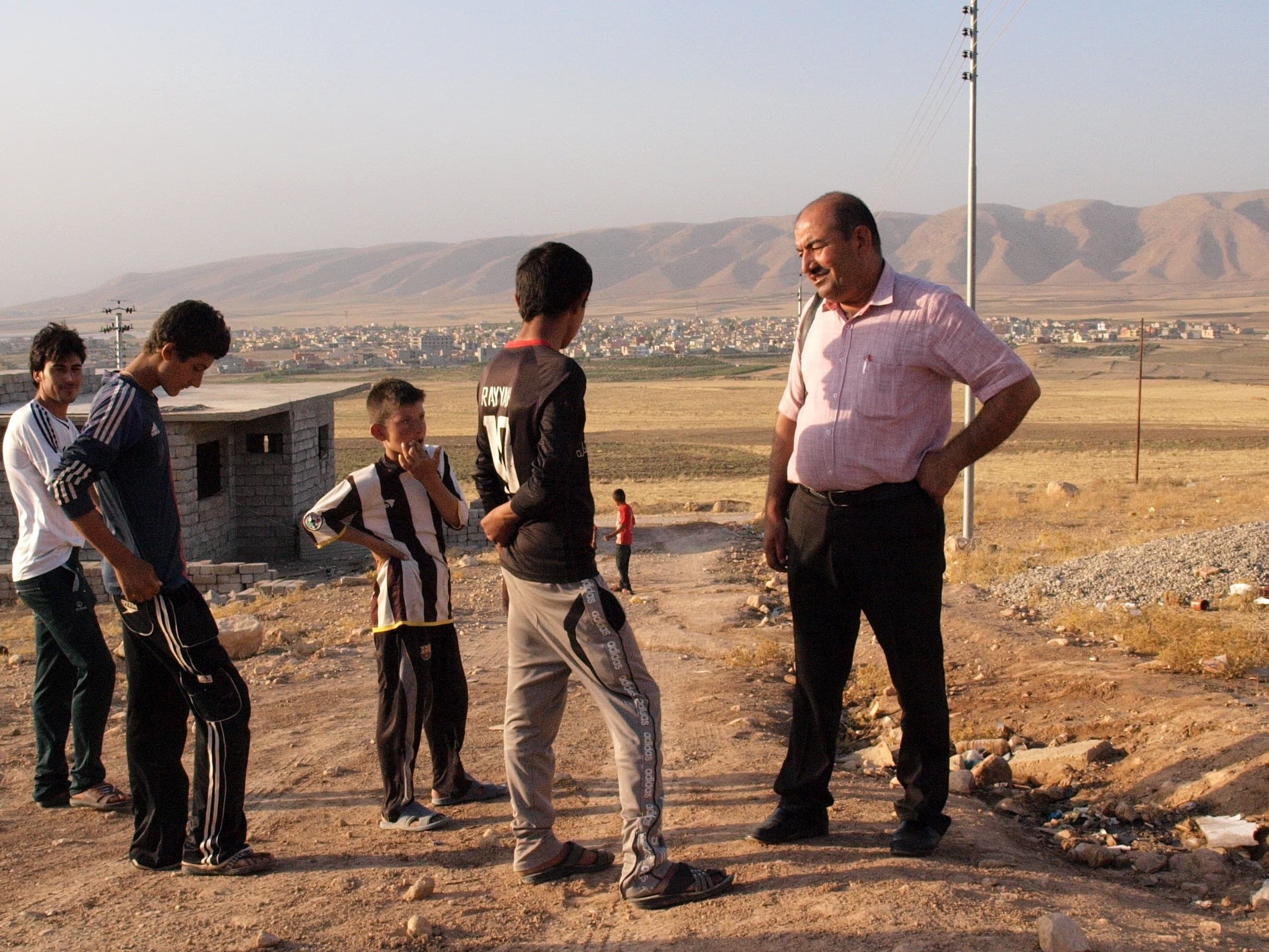 Author Khidher Domle at work with Kurdish Yezidi refugees.