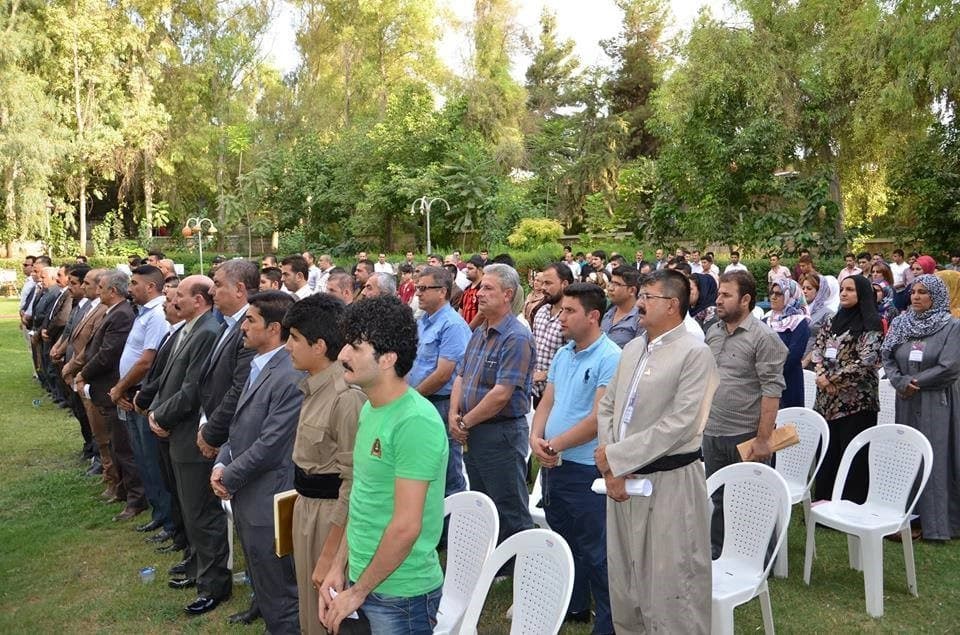 A minute of silence is observed for Shingal in a Halabja ceremony. Photo from Facebook. 