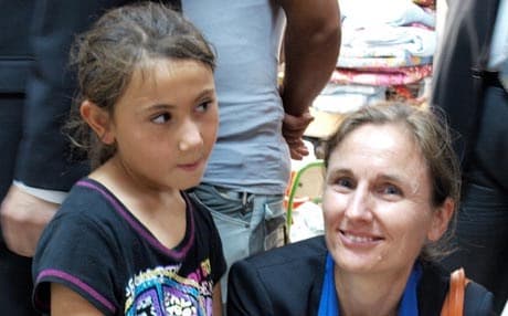 Outgoing Dutch Ambassador to Iraq Jeannette Seppen (right) next to a Christian girl in an IDP camp. Photo by Judit Neurink. 