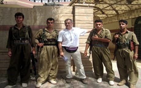 Martorell (center) poses with rebels of the Kurdistan Democratic Party of Iran (KDPI) in northern Iraq. Photo: Cuartopoder.