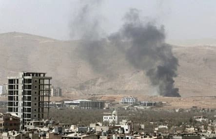 Smoke rises during clashes between forces loyal to Syria's President Bashar Assad and the Army of Islam fighters, on the eastern mountains of Qalamoun overlooking the town of Douma, eastern Ghouta in Damascus September 14, 2015. Reuters photo.  