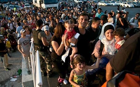 Syrian migrants board the ferry Eleftherios Venizelos at the southeastern island of Lesbos, Greece. Photo: AP