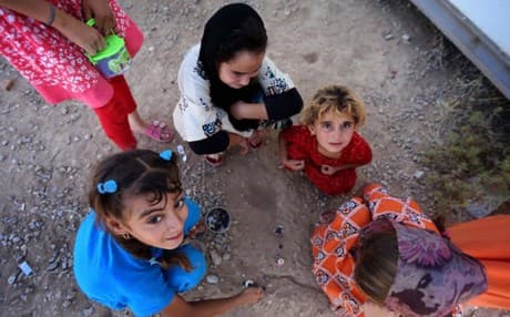 Children in the Harsham refugee and IDP camp. AFP photo. 