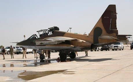 A Russian Sukhoi Su-25 fighter plane arrives at Iraq's al-Muthanna military airbase at Baghdad airport, in Baghdad, July 1, 2014. Photo: Reuters