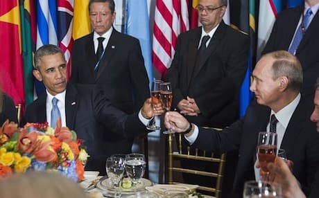 US President Barack Obama and his Russian counterpart Vladimir Putin join in a toast at a luncheon hosted at the UN headquarters in New York. Photo: AP