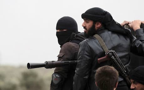 Jabhat al-Nusra fighters in the outskirts of Aleppo, Syria. Photo: AFP