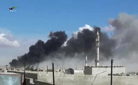  Russian warplanes carried out air strikes in three Syrian provinces, including Homs, along with regime aircraft on September 30, according to a Syrian security source. (AFP PHOTO / Homs Media Center) 