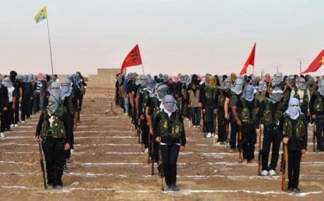 YPG forces at a training base in Rojava. Photo: AFP. 