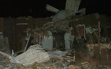 Photo published by the MEK of the aftermath of Thursday's rocket attack on their camp near Baghdad airport.  