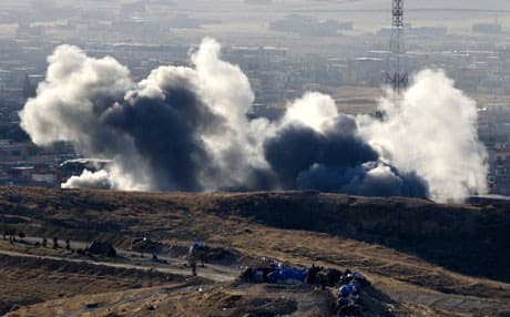 Smoke from explosions rises around Shingal during the two-day Peshmerga offensive. Rudaw photo.