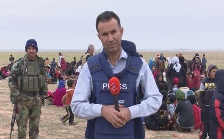Families previously living under ISIS in Shingal gather near Peshmerga positions. Photo: Rudaw