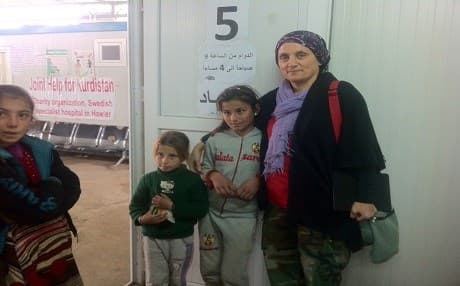 Dr Nemam of the Joint Help for Kurdistan with Yezidi children at camp Bajed Kandal camp near Duhok. Photo by author
