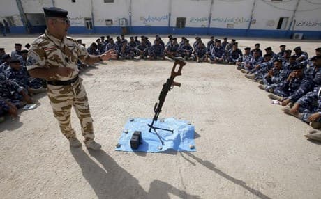 Newly-recruited Iraqi security forces train outside Karbala. AFP file photo. 