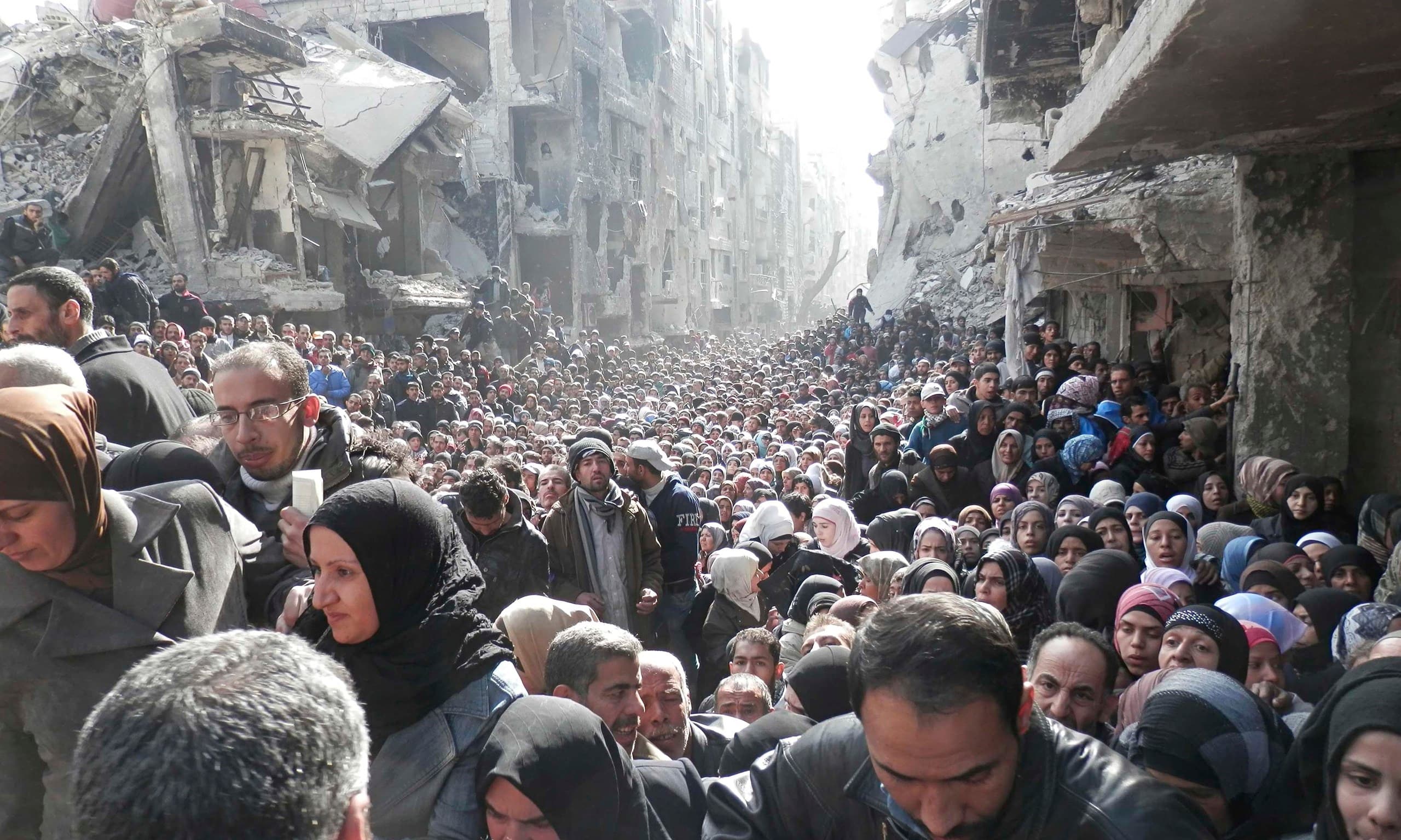 Palestinians in the Yarmouk refugee camp. AP file Photo.