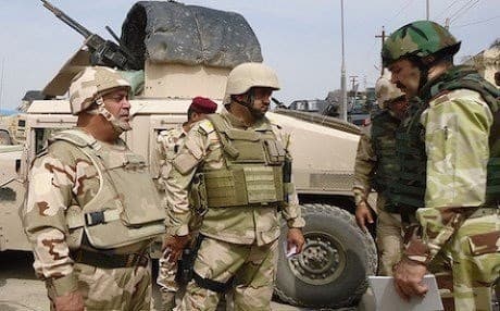 Iraqi army officers in Anbar. AP file photo.