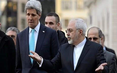 US Secretary of State John Kerry and Iranian Foreign Minister Mohammad Javad Zarif, as they walk in the city of Geneva, Switzerland, during a bilateral meeting ahead of nuclear discussions. AP Photo. 