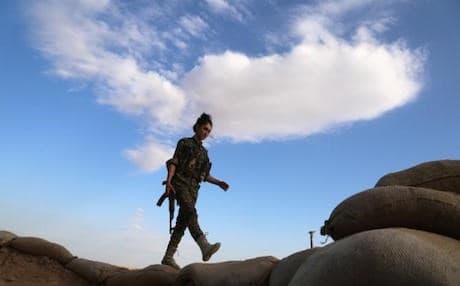 A Kurdish member of the Syrian Democratic Forces (SDF) in the Al Hol countryside. Photo: AFP