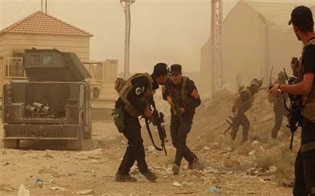 Iraqi forces battling ISIS in Ramadi, Dec,2015. AP photo