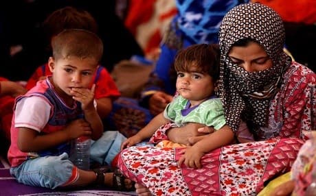 Reports: 2.2 million Iraqis displaced by Islamic Satet group. AP File Photo. 