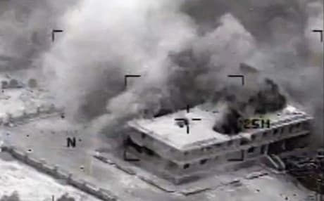 An image released by the US central command showing a structure in Tall Al Qitar,Syria moments after a US airstrikes. Photo: AP