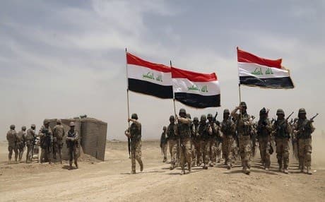 Iraqi army soldiers outside Baghdad, Iraq, Wednesday, May 27, 2015. AP Photo.
