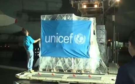 UN Supplies being unloaded from an airplane at Erbil International Airport.