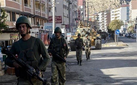  Turkish soldiers patrol a street in the Silvan distric.AFP File photo. 