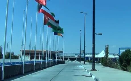 Various countries flags fly outside the Erbil International Fair Ground during the last day of the Third Erbil Oil and Gas International Exhibition.