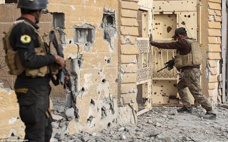 Iraqi security forces searching homes in Ramadi after the city's liberation from ISIS, Dec. 2015. AFP photo