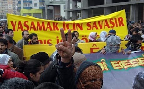 Protesters carry banners reading, "We fight for Life, we die for Peace" as they march to protest operations against Kurdistan Worker's Party (PKK) during a demonstration in Diyarbakir, Turkey. Photo: AFP