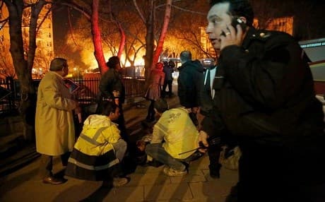 Emergency personnel tend to an injured person near the site of a suicide bomb in Ankara on Wednesday. AFP photo