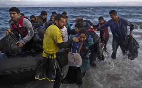 Syrian refugees land on Greek island of Lesbos. Photo: AP 