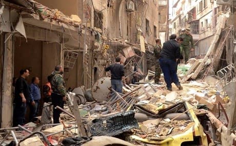 Collapsed buildings in the Syrian city of Aleppo, April, 2015. Photo: AFP