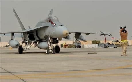 A Canadian Hornet fighter jet returns to base after the first airstrike over Syria,  April 2015. Photo: DND. 