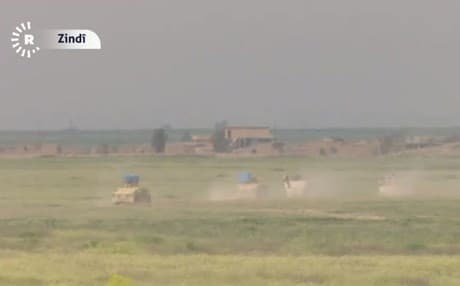 Iraqi army armored vehicles launching assaults against ISIS held-villages western Makhmour. 