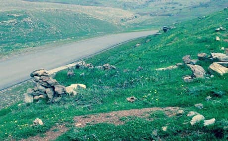 Residents say that rocks were used to fashion makeshift tombstones. Photo: Rudaw