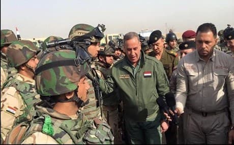 Iraq's defense minister Khaled al Obeidi with members of Iraq's 71st brigade prior to their deployment to Makhmour front. Photo: alobeidi/twitter