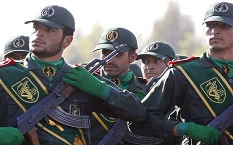 Iranian Revolutionary Guard members march during a parade. AP file photo
