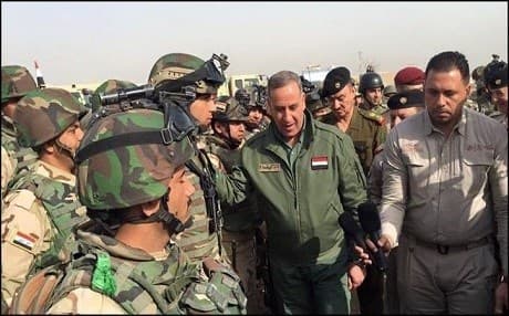 Iraqi Defense Minister Khalid al-Obaidi meeting troops on the frontline.  Photo: al-Obaidi/twitter