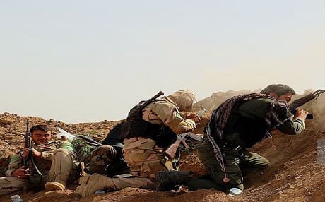 Shiite militia known as Hashd al-Shaabi launcing an assault against ISIS militant to regain control of Shiite Turkmen village of Bashir, southern Kirkuk. Photo: AA