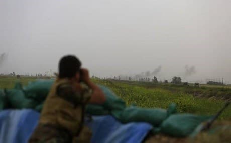 Clashes near Syria's border with Turkey. AP Photo. 